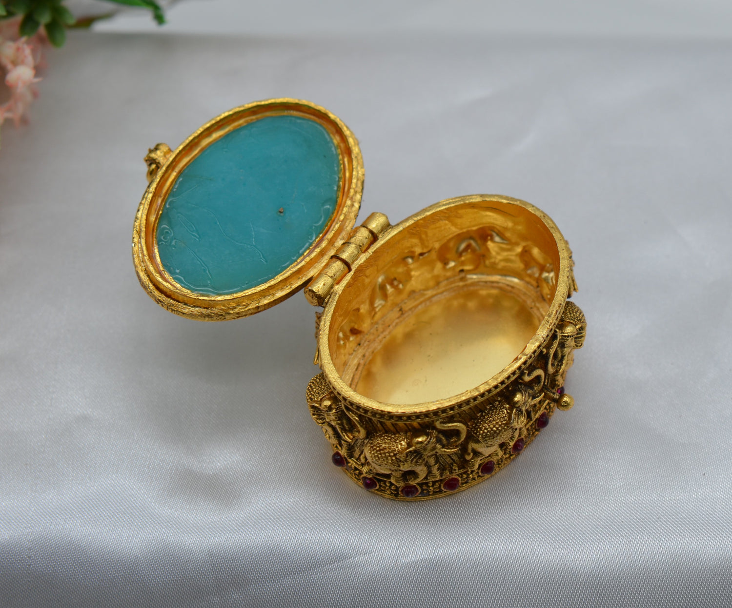 Oval Shape Stone Sindoor Box with Elephant Carving