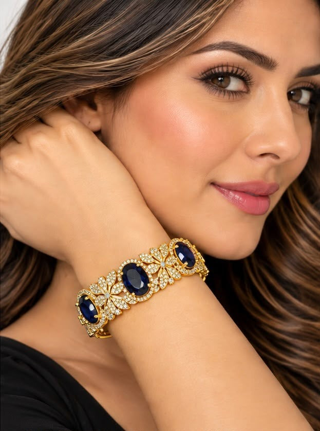 Sapphire blue American diamond gold bracelet worn on the wrist – Sparkling Trendz