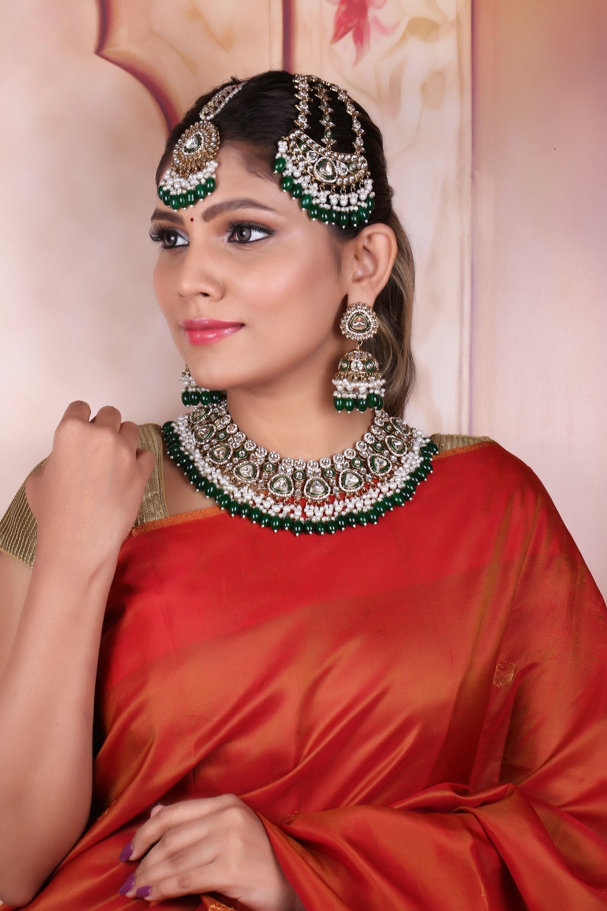 Emerald Polki Bridal Choker Set with Jhumkas, Maang Tikka & Passa, worn by model