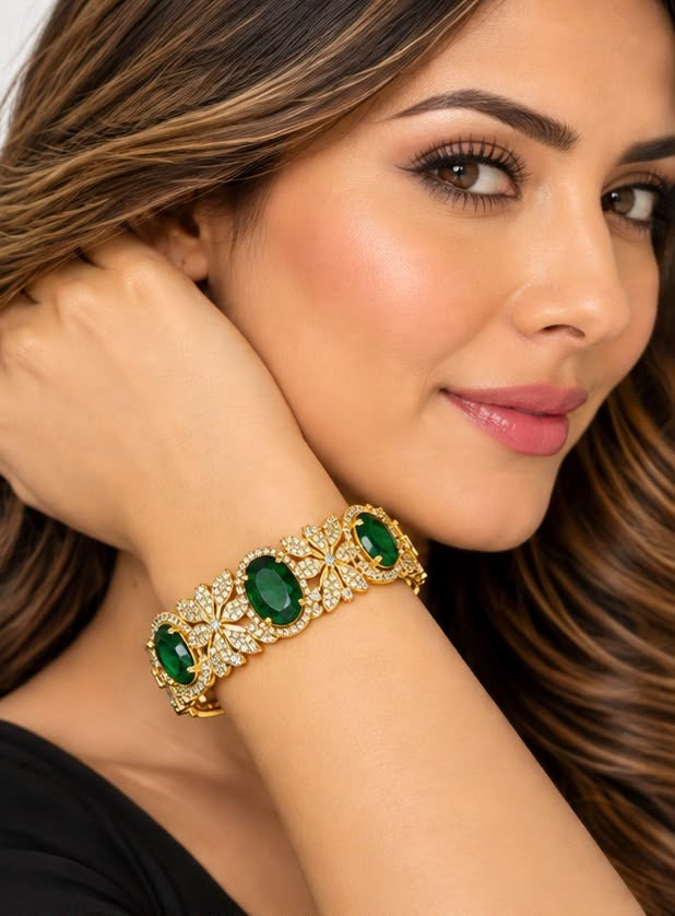 Emerald green American diamond gold bracelet worn on the wrist – Sparkling Trendz
