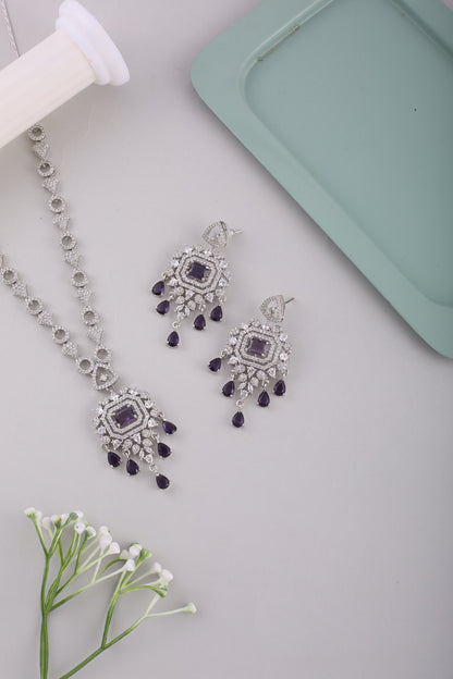 Amethyst Purple American Diamond Pendant Necklace Set with Chandelier Earrings, styled flat lay