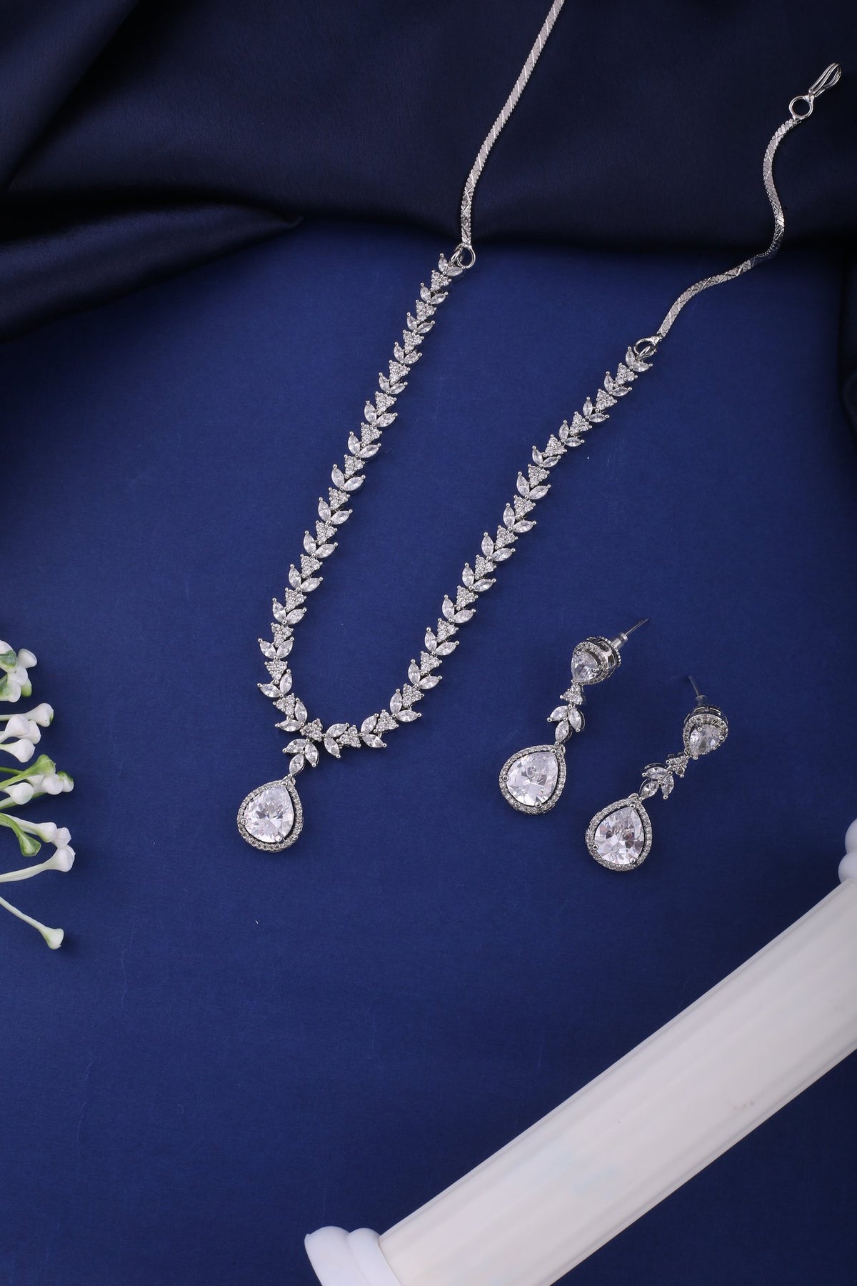 Clear American Diamond Leaf Vine Necklace Set, styled flat lay