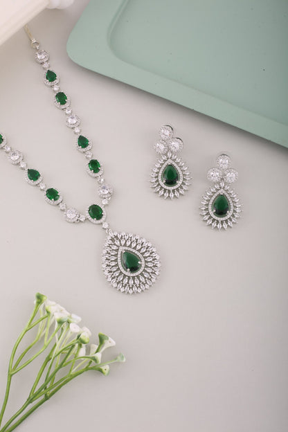 Emerald Green American Diamond Teardrop Pendant Necklace Set, styled flat lay