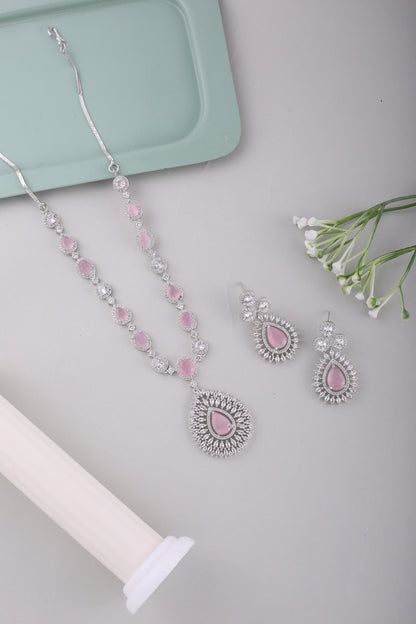 Pink American Diamond Teardrop Pendant Necklace Set, styled flat lay