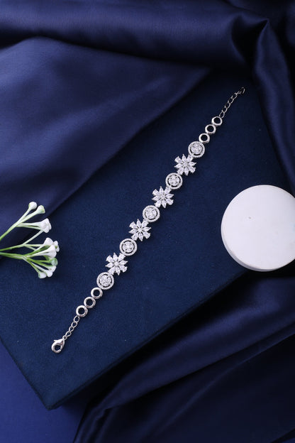 Silver Floral Cubic Zirconia Link Bracelet, styled flat lay