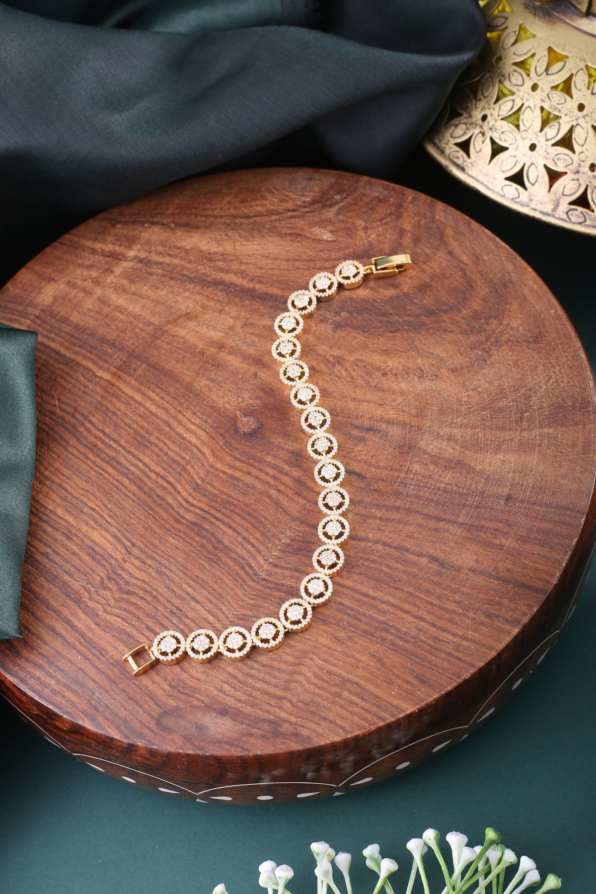 Rose Gold Cubic Zirconia Link Bracelet, styled flat lay