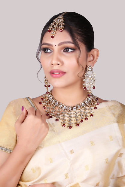 Ruby Red Kundan Cascade Necklace Set with Maang Tikka, worn by model