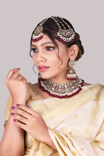 Ruby Polki Bridal Choker Set with Jhumkas, Maang Tikka &amp; Passa, worn by model