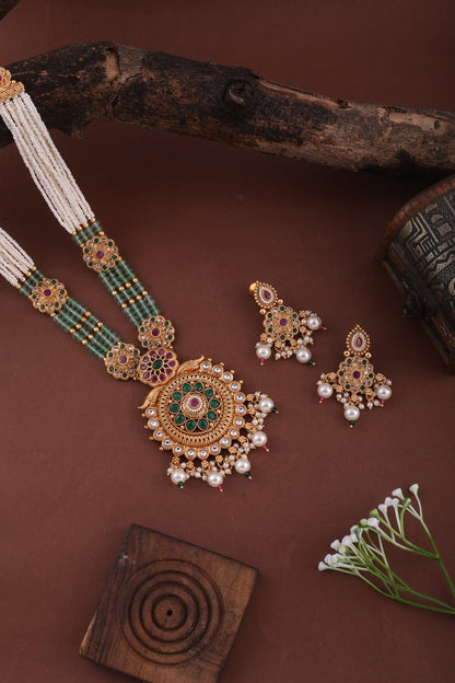 Antique Gold Temple Pendant Long Necklace Set with Pearl &amp; Mint Beads, styled flat lay