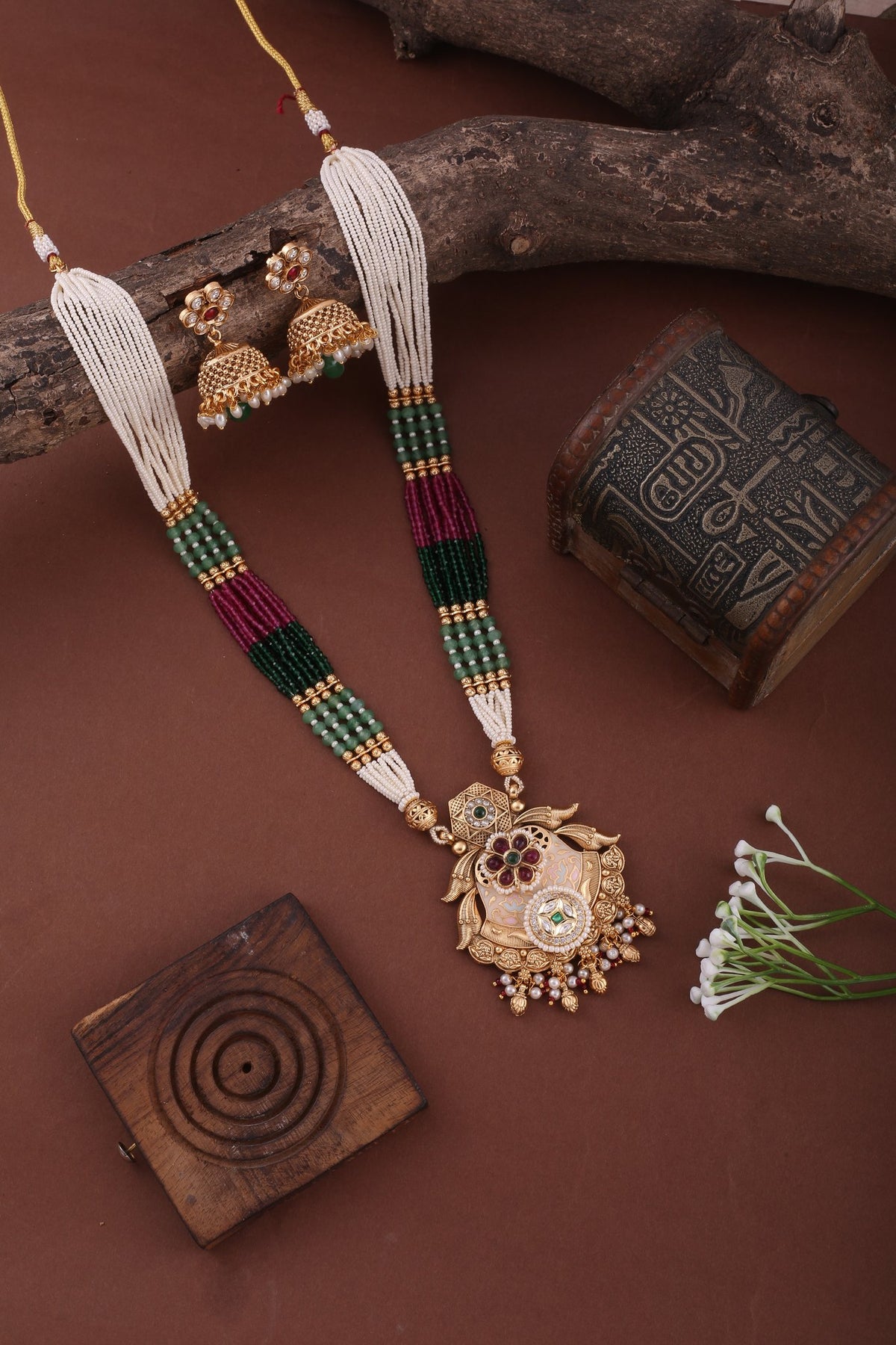 Multicolor Bead Pearl Long Necklace Set with Temple Pendant &amp; Jhumkas, styled flat lay