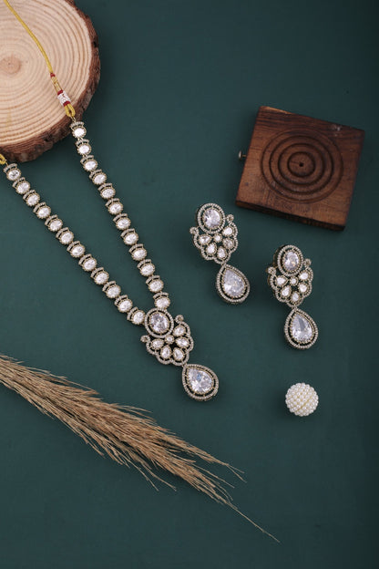 Ivory Victorian Kundan American Diamond Long Necklace Set, styled flat lay