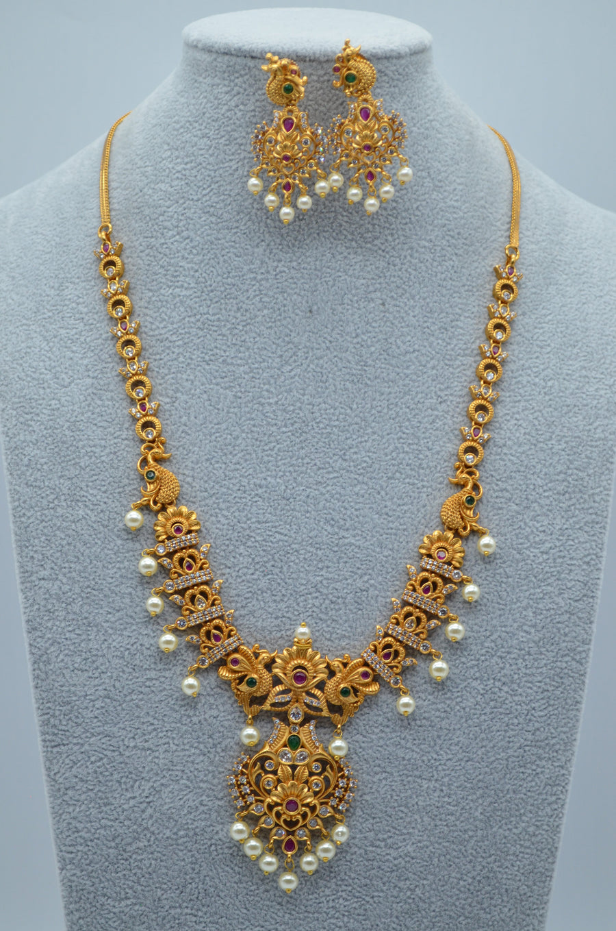 Peacock Kemp Multi Stone Ad Studded Long Necklace Set Necklaces
