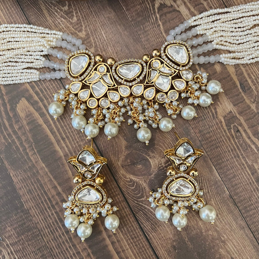 Tyaani Uncut Kundan Necklace Set With Pearl Tassels. Grey Necklaces