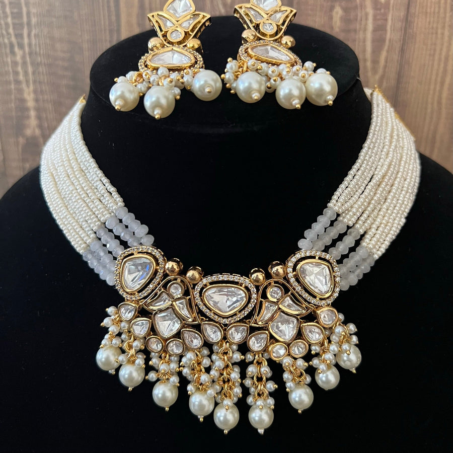 Tyaani Uncut Kundan Necklace Set With Pearl Tassels. Necklaces