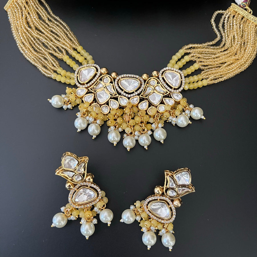 Tyaani Uncut Kundan Necklace Set With Pearl Tassels. Yellow Necklaces
